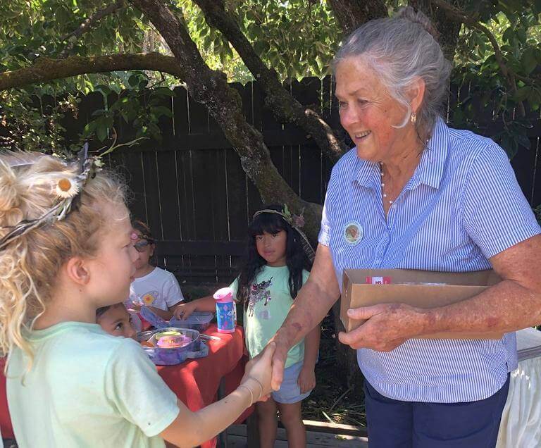 Charlotte Torgovitsky with children at Summer Camp